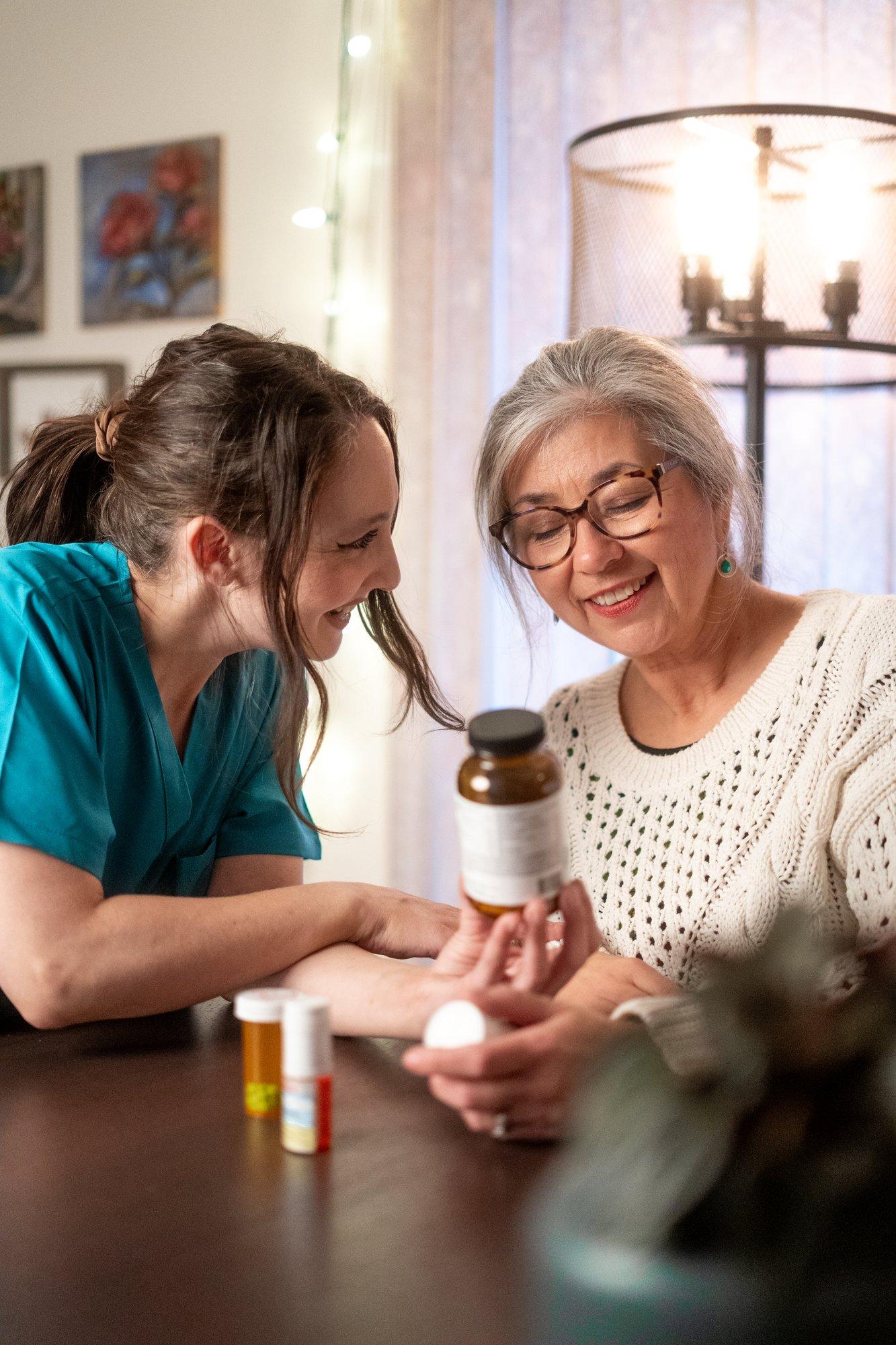 CareLink caregiver helping client with medicine in Ottawa